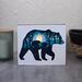 small bear and cub with lights